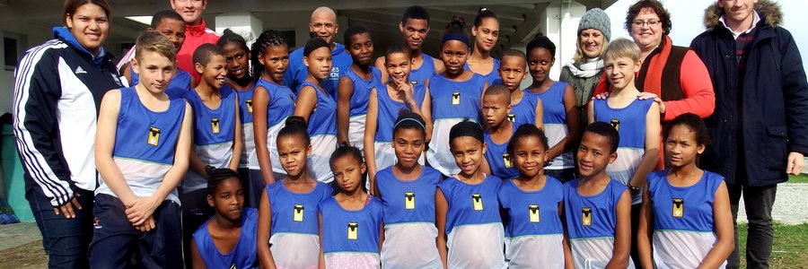 A group picture during the hand-over to the Foundation’s Athletics children, with Adéle Geldenhuys, Taurus General Manager 2nd from the right.  
